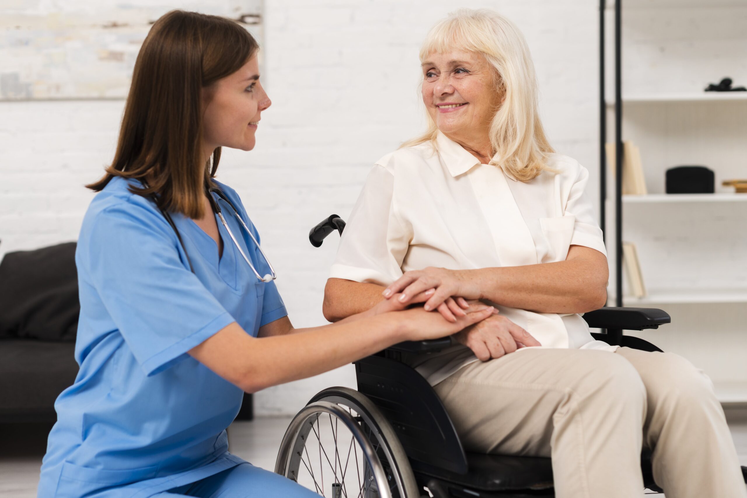 caregiver-taking-care-woman-wheelchair-min